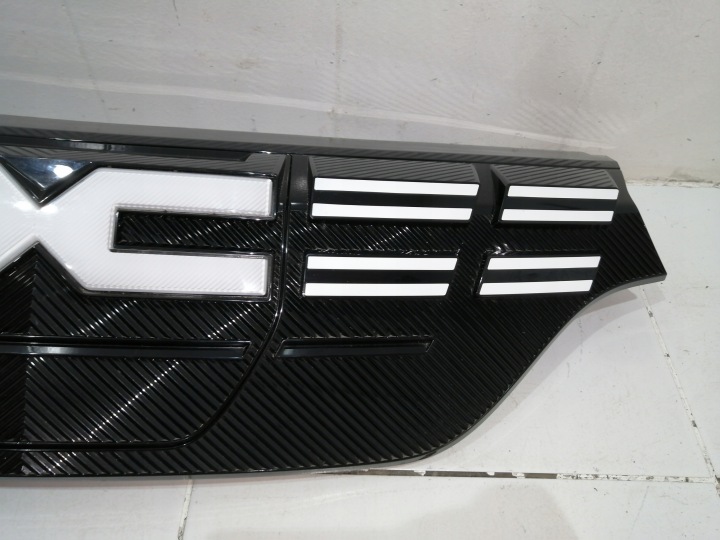 GRILLE CALANDRE DACIA SPRING LIFT HAL 8715