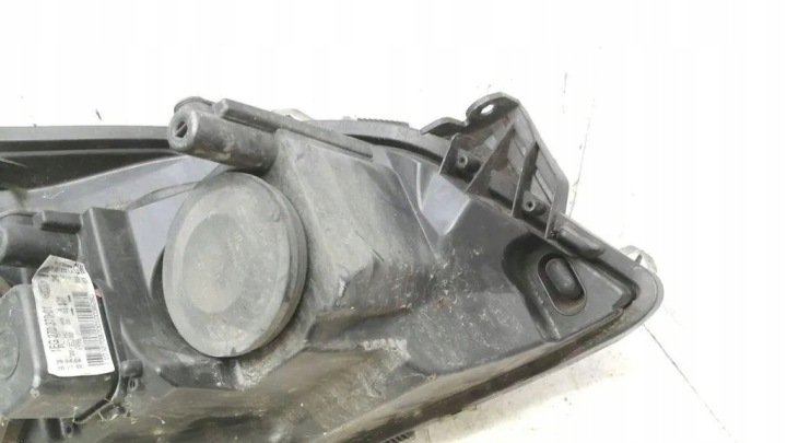 PHARE GAUCHE AVANT OPEL ASTRA H (L48) 1EG27037001 1.9L DIESEL 74KW 2006