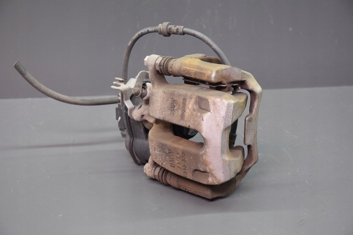 фото №1, Супорт притиск лівий зад bmw x5 g05 x6 g06 x7 g07