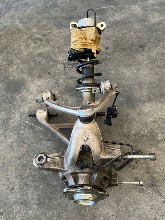 фото №1, Ferrari portofino f164 поворотный кулак рычаг mcperson амортизатор перед левая