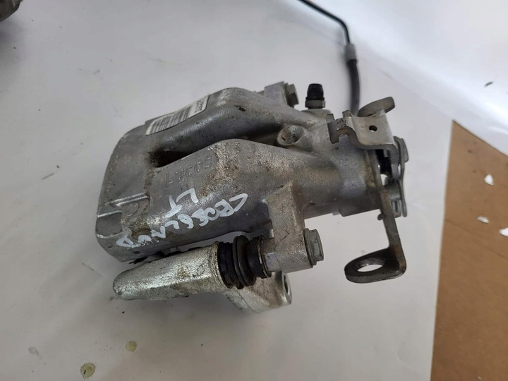 фото №1, Crossland x супорт гальмівний лівий зад 32055429