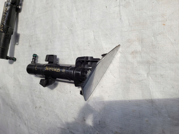 фото №1, Superb 2 ii рестайлинг - распылитель фара левый