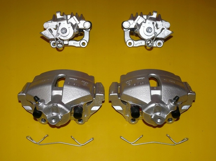 фото №10, Затискачі лівий правий перед зад skoda rapid 288 230