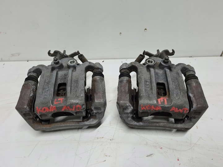 фото №1, Hyundai kona суппорт тормозной левый зад 4x4