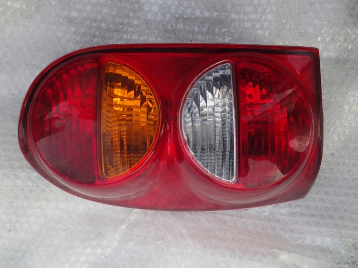 фото №1, Jeep cherokee liberty kj 01-07 лампа задняя левая 4 лампочки