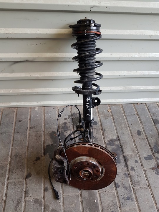 фото №1, Fiat 500x амортизатор поворотный кулак левая