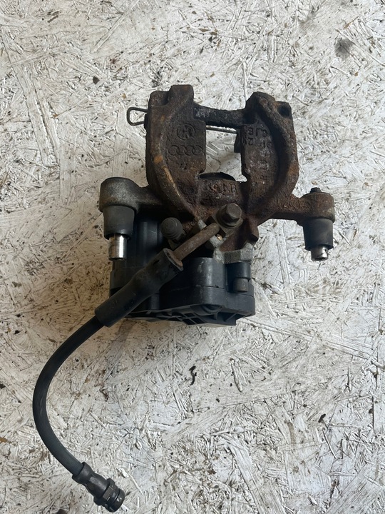 фото №1, Супорт гальмівний лівий зад vw golf vii 5q0615405bc