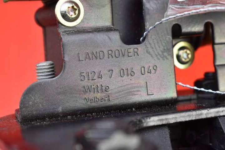 фото №9, Замок кришки зад багажника лівий нижній 7016049 land rover discovery 3 iii