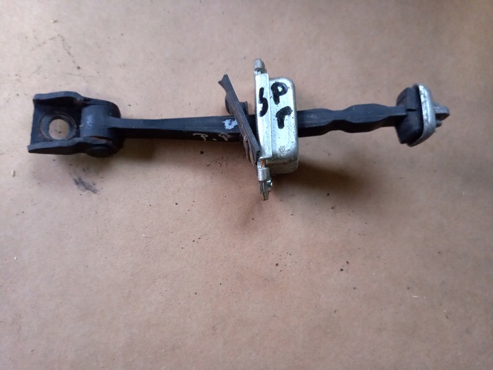 фото №1, Обмежувач двері праві перед skoda octavia ii