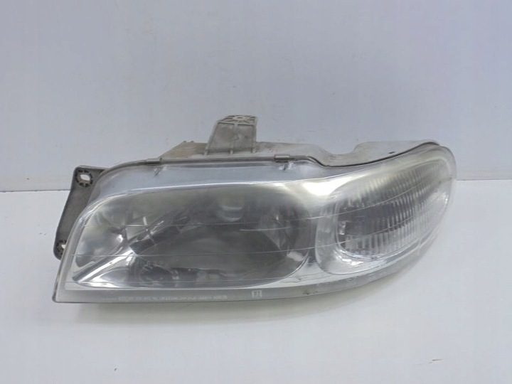 фото №1, Daewoo nubira i j100 фара лівий h4 0301-000711