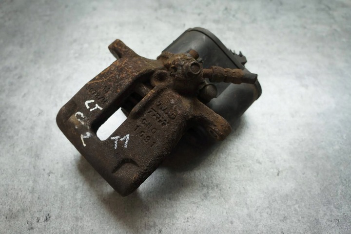 фото №1, Суппорт тормозной моторчик левый зад vw passat cc