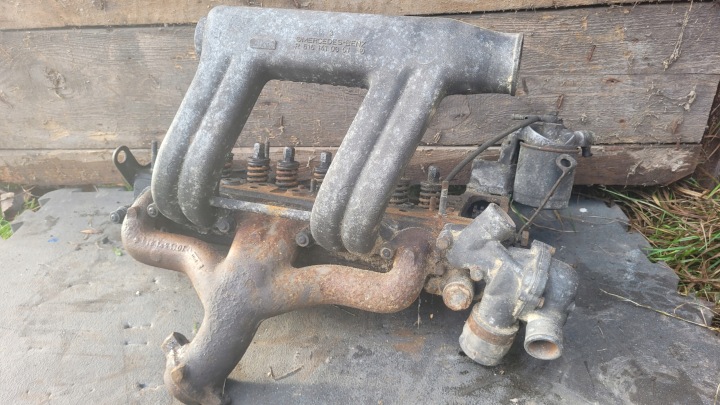 фото №8, Mercedes w115 w123 головка цилиндров коллектор впускной 6161410801