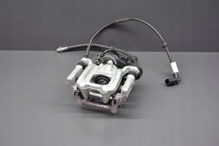 фото №1, Суппорт прижим левый зад bmw x1 u11 2 u06