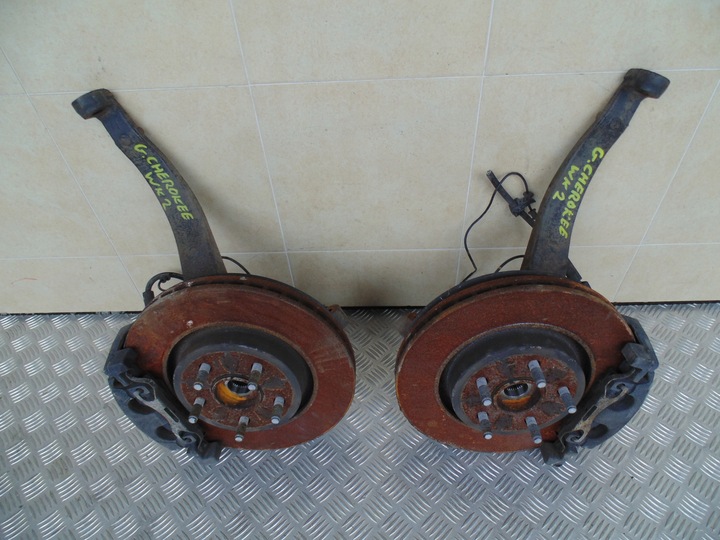 фото №1, Поворотный кулак левая jeep grand cherokee wk2 рестайлинг