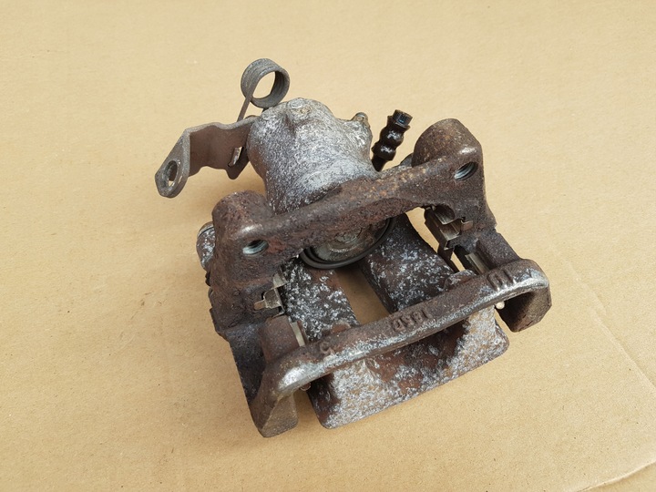 фото №7, Суппорт тормозной + скоба левый зад opel zafira b astra h 38mm исправный