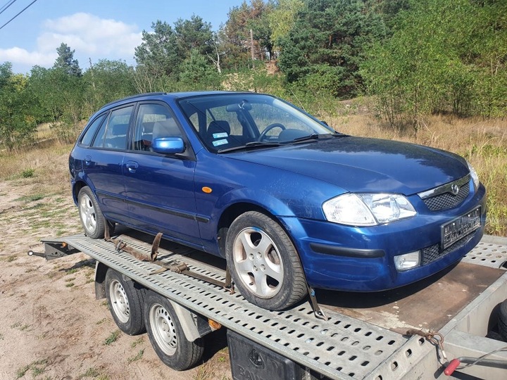 фото №16, Бампер задній mazda 323 2000r