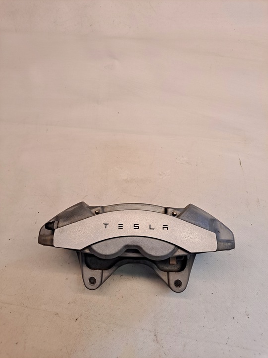 фото №1, Супорт гальмівний лівий перед tesla 3 1044621-00-e