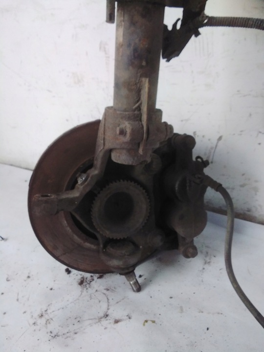 фото №4, 7176 ford transit mk7 поворотный кулак амортизатор левый