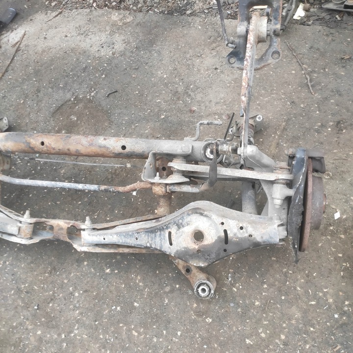 фото №11, Вісь підвішування зад візок балка поворотна опора vw passat b6