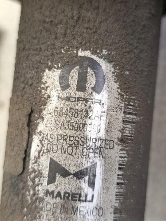 фото №9, Амортизатор jeep grand cherokee v 2022 з спереди з левый 68458142af