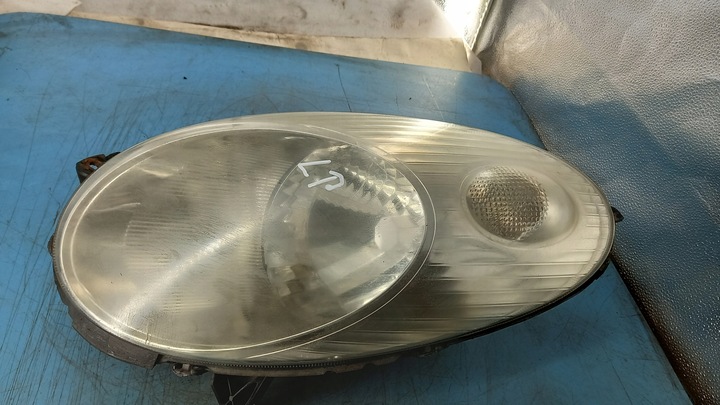 фото №1, Фара левый nissan micra 1.2b 04r