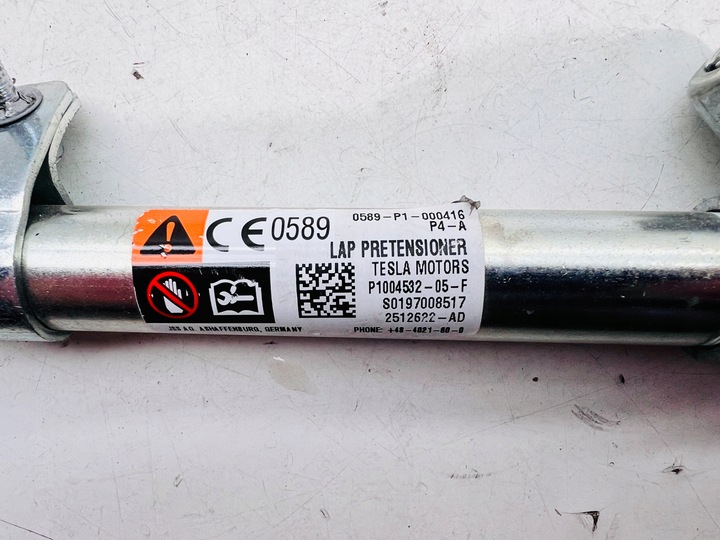 фото №1, Натягувач кліпса ременя лівий перед p1004532-05-f tesla модель s x 12- європа