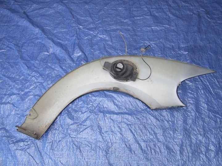 фото №7, Volkswagen beetle 2013 планка накладка захист крила права зад