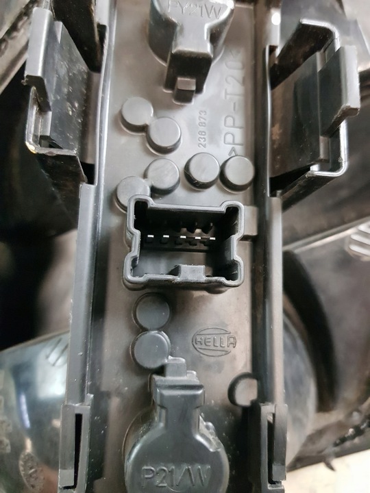 фото №7, Nissan almera n16 лампа левая задняя + вкладка hella 2va236841-030