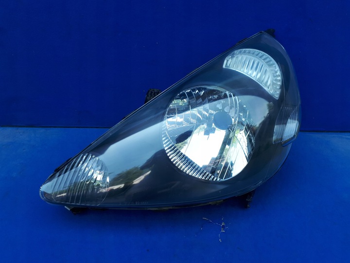 фото №1, Honda jazz 02-05 2002-2005 фара лампа ліва передня замінник tyc