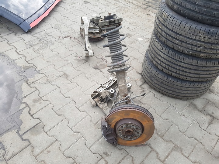 фото №1, Vw eos 06-10r 2.0 tdi амортизатор поворотный кулак левая