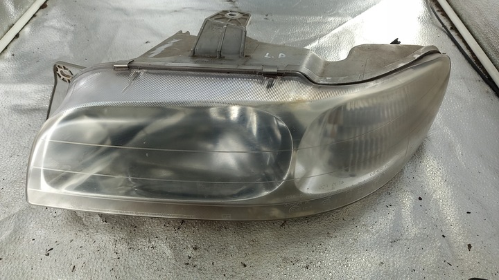 фото №1, Фара лівий daewoo nubira i 1.6b 99r sedan