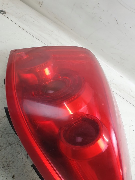 фото №10, Лампа лівий зад nissan primera p12 03r. hb liftback