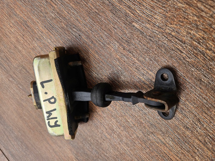 фото №1, Jeep grand cherokee wj 99-04r ограничитель дверь перед левый