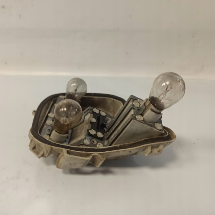 фото №12, Audi a4 b7 вкладка лампи лівий зад 484061l