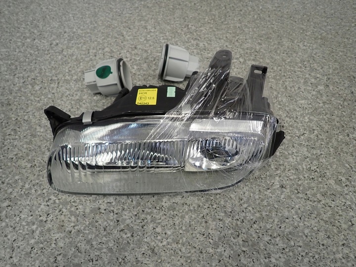 фото №1, Mazda 323 ba f 94-98 лампа передня ліва фара