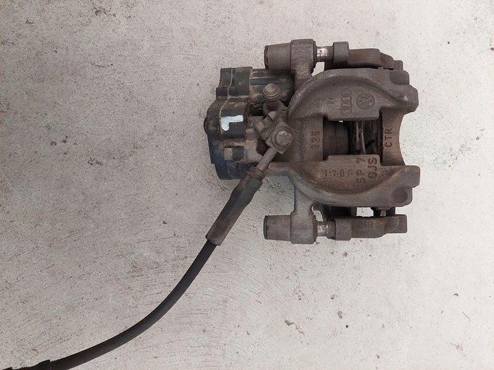 фото №1, Golf vii sportsvan супорт гальмівний лівий зад