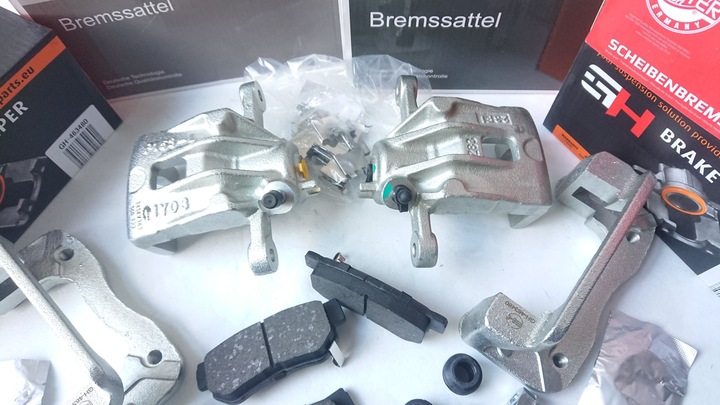 фото №4, Зажимы + jarzma + тормозные колодки тормозные зад hyundai tucson 2.0