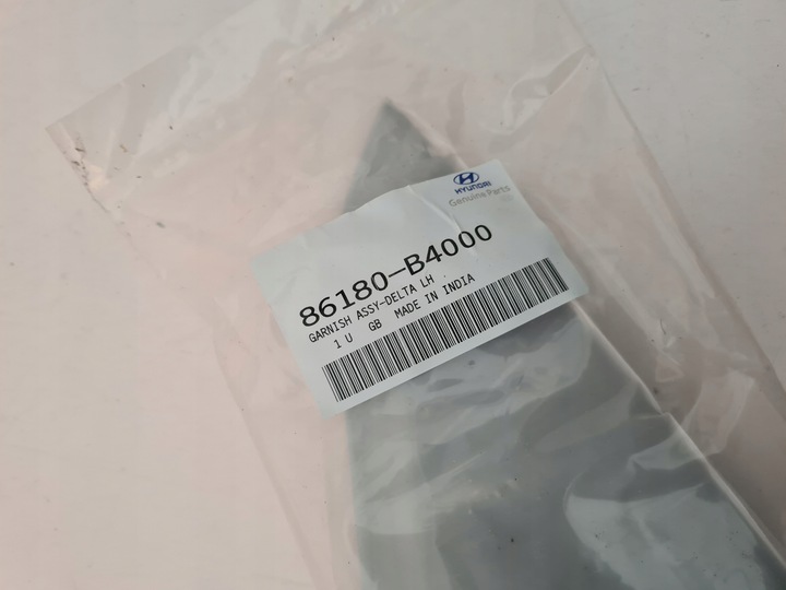 фото №1, Заглушка крила ліва hyundai i10 86180-b4000 нова