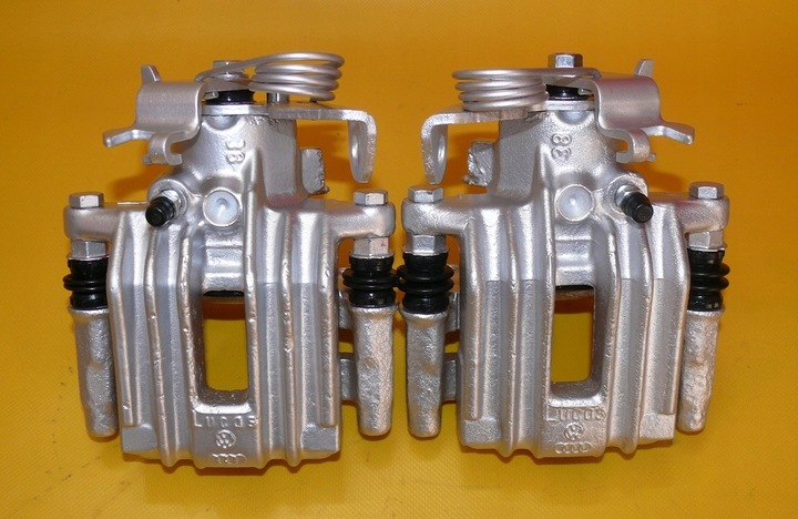 фото №1, Затискачі лівий праві зад audi a6 c5 255/10mm quattro