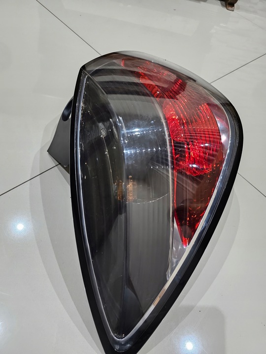 фото №2, Лампа лівий зад opel astra iii h gtc 24451832