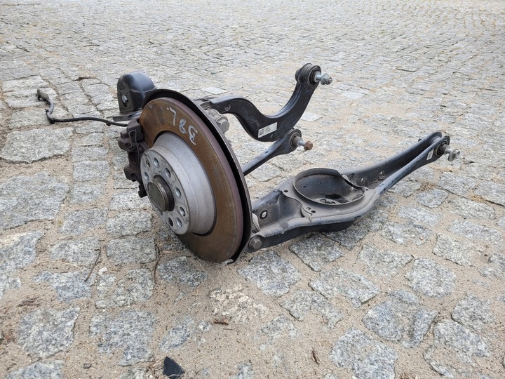 фото №1, Поворотный кулак суппорт рычаг ступица зад левая vw passat b8 универсал 2.0 3q0615405