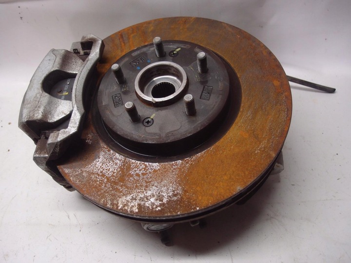 фото №1, Поворотна опора ступиця диск лівий перед tucson iv