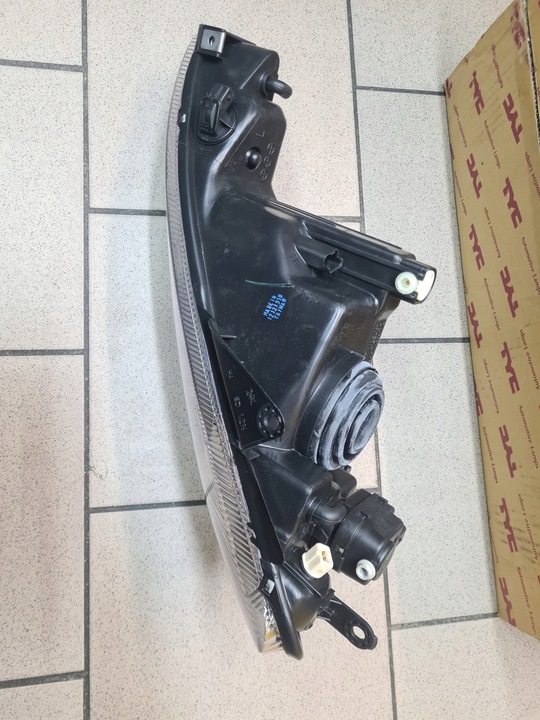 фото №5, Лампа фара левый h4 peugeot 206 cc 1998-2009