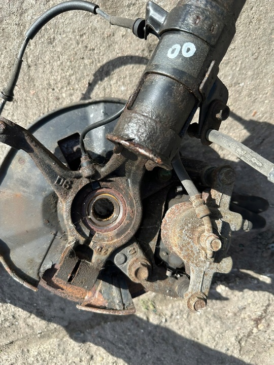 фото №4, Поворотный кулак mcperson амортизатор левый dr6134900c mazda 2