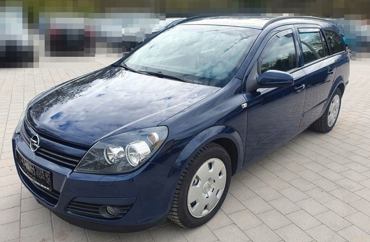 фото №9, Застібка ременя ліві перед opel astra h iii 04-06