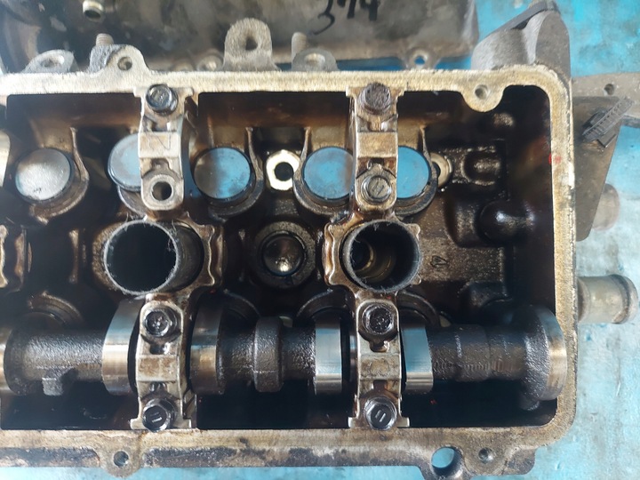 фото №11, Головка daihatsu cuore 1.0 b ej