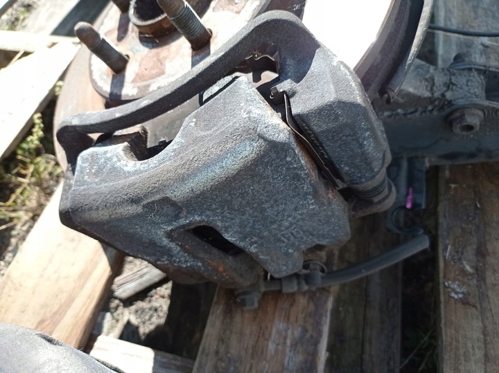 фото №1, Супорт гальма лівий праві перед insignia a