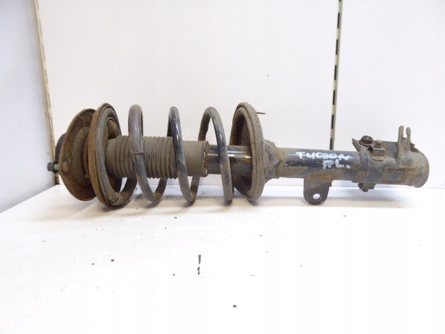 фото №1, Tucson i 04-10 амортизатор пружина перед лівий 2.0 16v g4gc