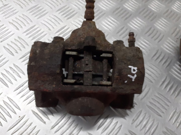 фото №1, Супорт гальмівний праві зад mercedes w210 3.2 cdi