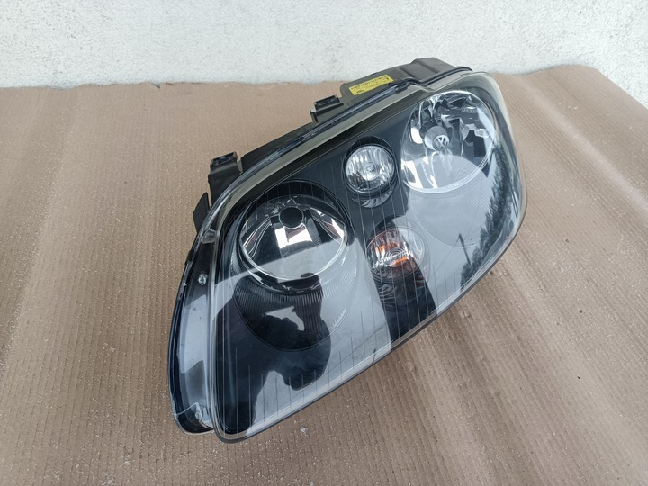 фото №3, Лампа перед передняя левая vw touran i 03- оригинал оригинальный номер тёмное 1t0941005p